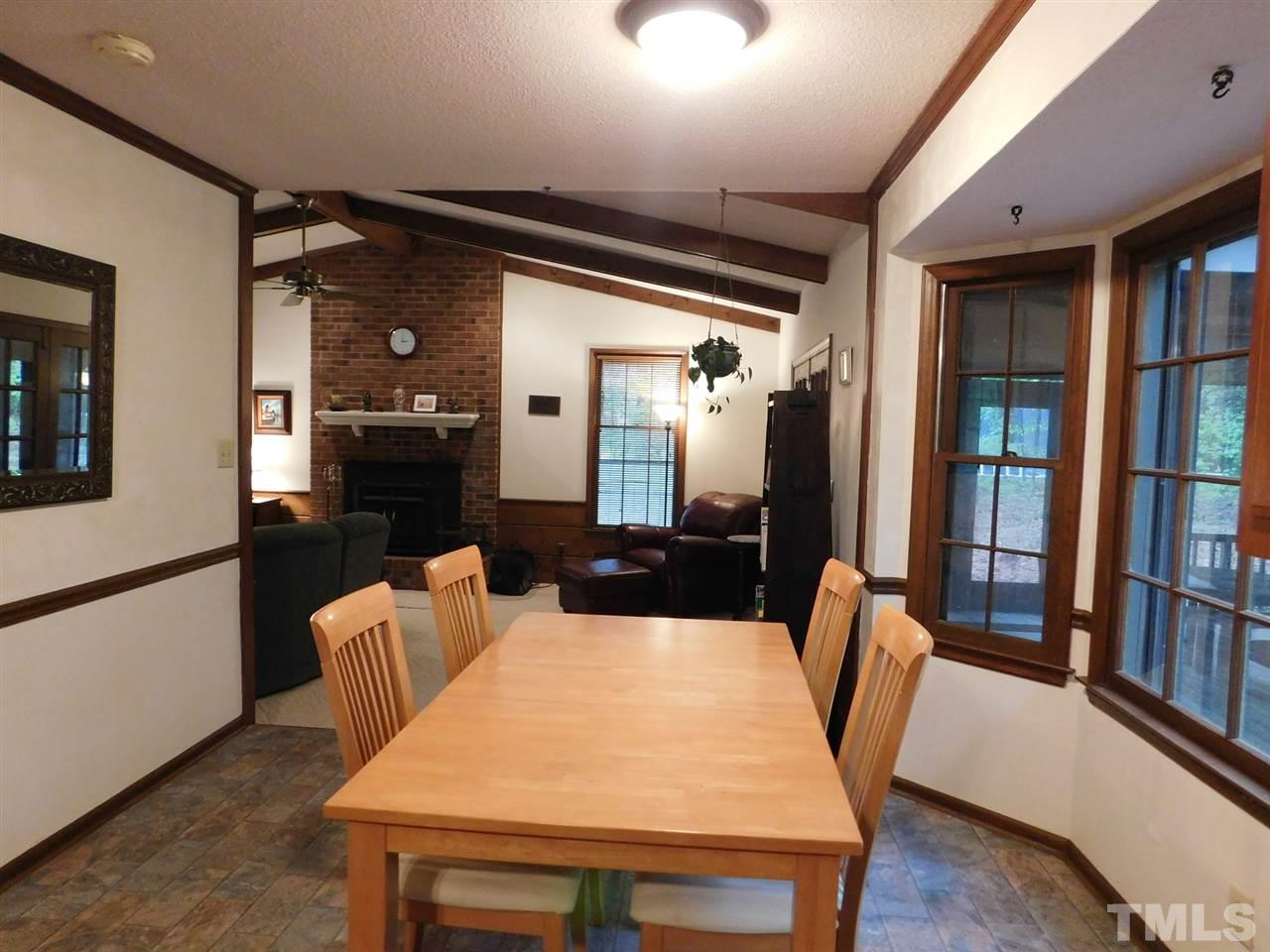 3224 Brennan Drive Raleigh, NC 27613 - Photo 10 of 22 a dinning room with furniture and a table