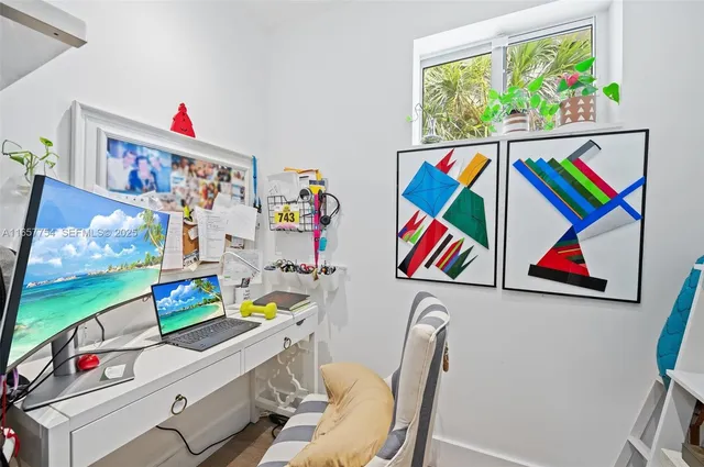 a room with musical instruments and air hockey table