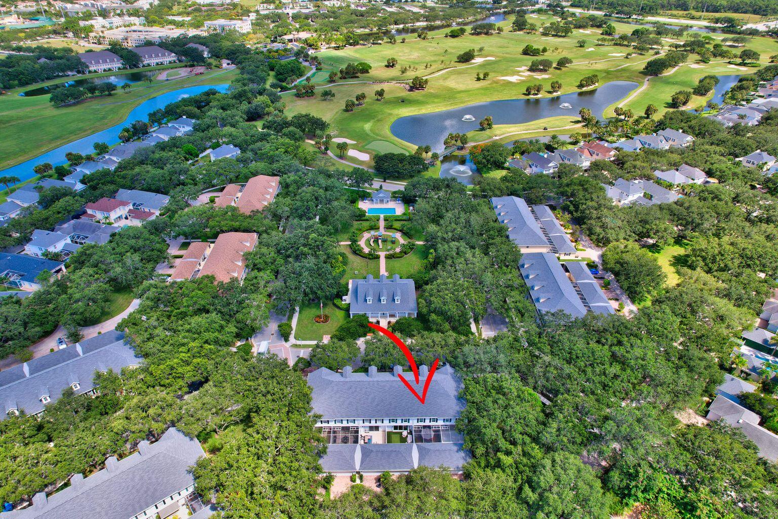 180 Freeport Drive Jupiter, FL 33458 - Photo 4 of 34 an aerial view of residential houses with outdoor space and street view