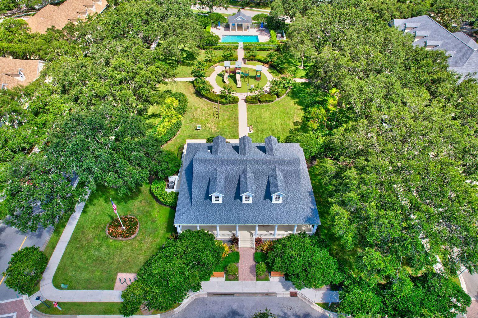 180 Freeport Drive Jupiter, FL 33458 - Photo 5 of 34 a view of a yard in front of house