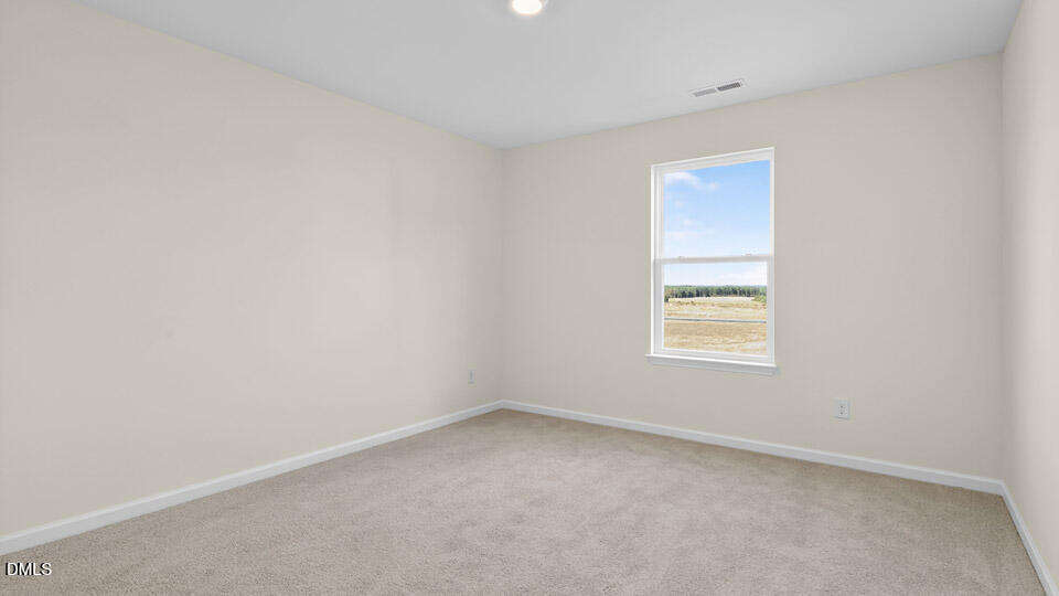11 Red Clover Drive Angier, NC 27501 - Photo 20 of 33 an empty room with a window