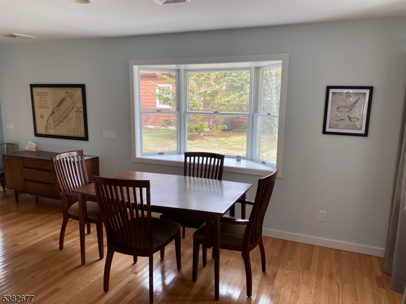 3 Old Lane Newfoundland, NJ 07435 - Photo 11 of 15 a view of a dining room with furniture window and wooden floor
