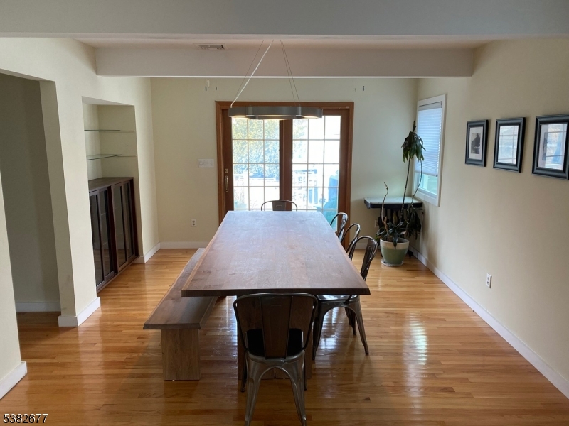 3 Old Lane Newfoundland, NJ 07435 - Photo 10 of 15 a view of a dining room with furniture and wooden floor
