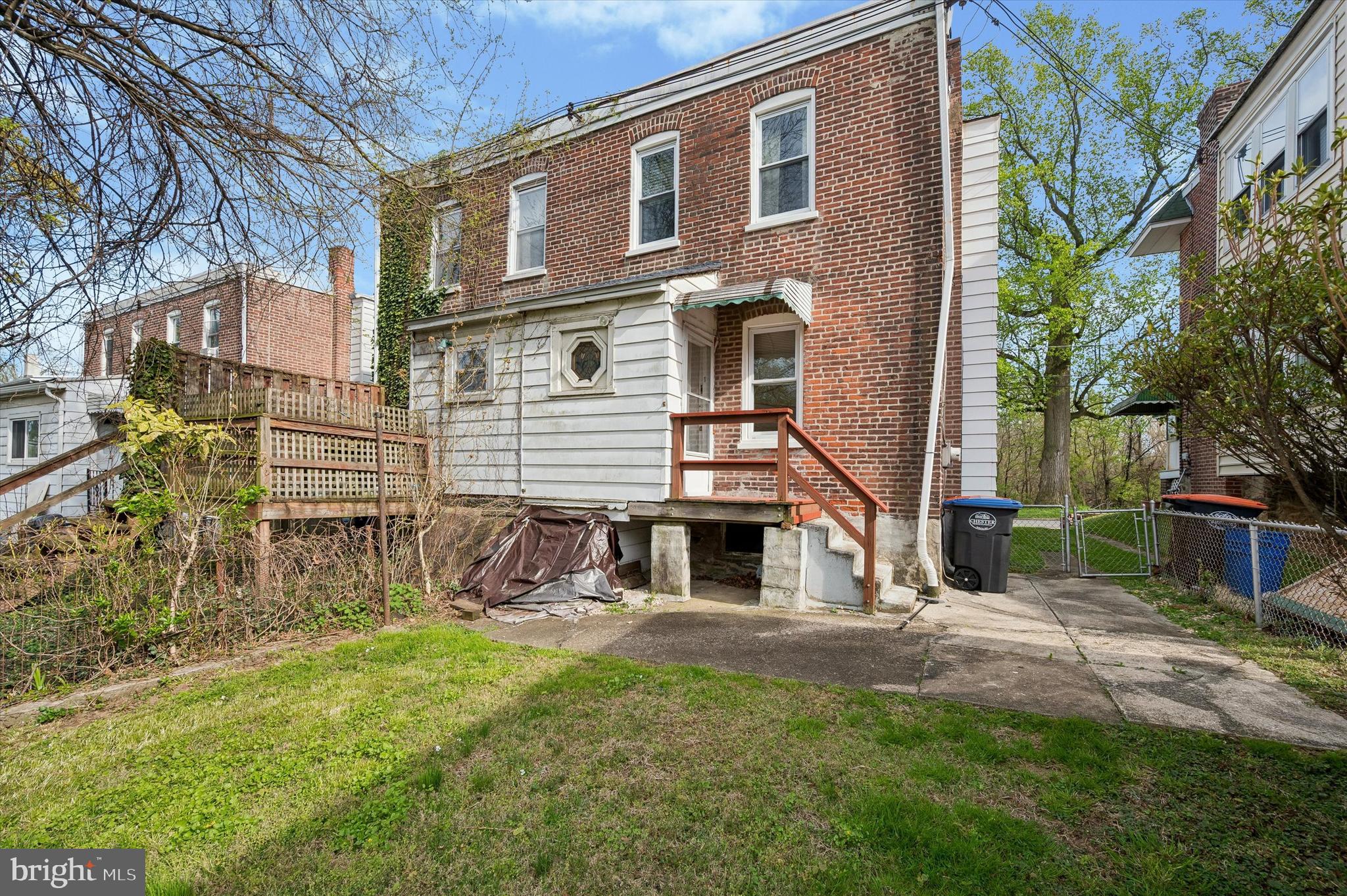 1008 East 18th Street Chester, PA 19013 - Photo 23 of 25 a view of a house with a yard and sitting area