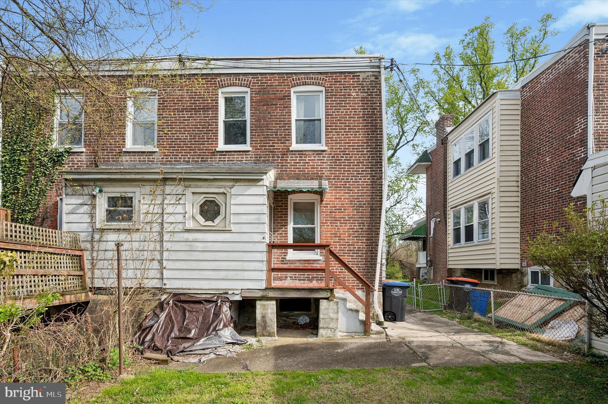 1008 East 18th Street Chester, PA 19013 - Photo 24 of 25 a front view of a house with garden