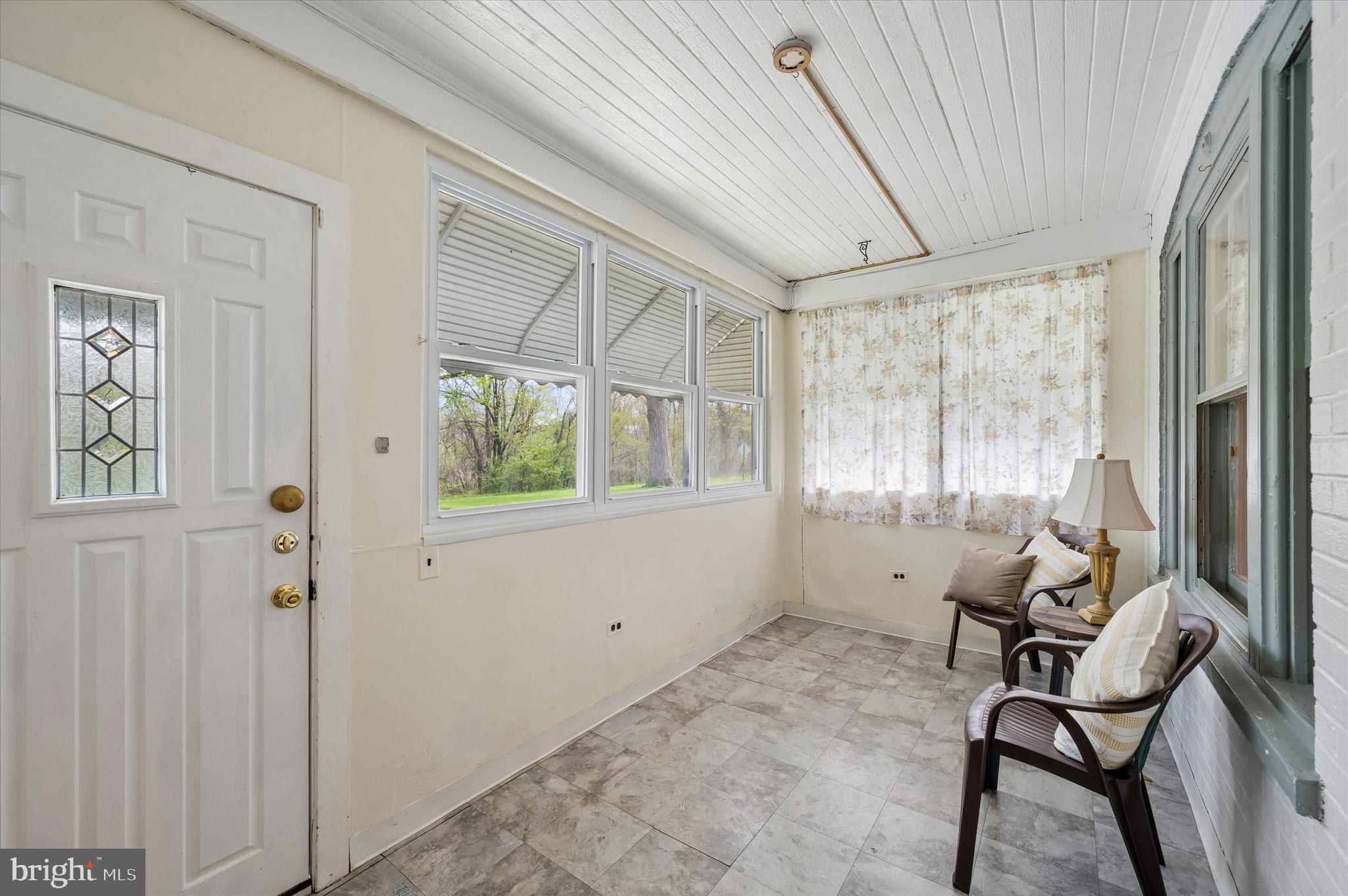 1008 East 18th Street Chester, PA 19013 - Photo 3 of 25 a view of a room with furniture and windows