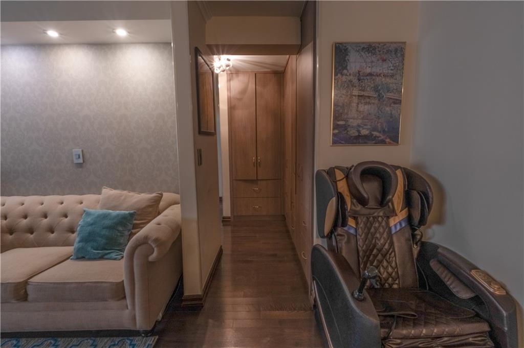 464 Neptune Avenue, Unit 3F Brooklyn, NY 11224 - Photo 4 of 15 a living room with furniture and a ceiling fan