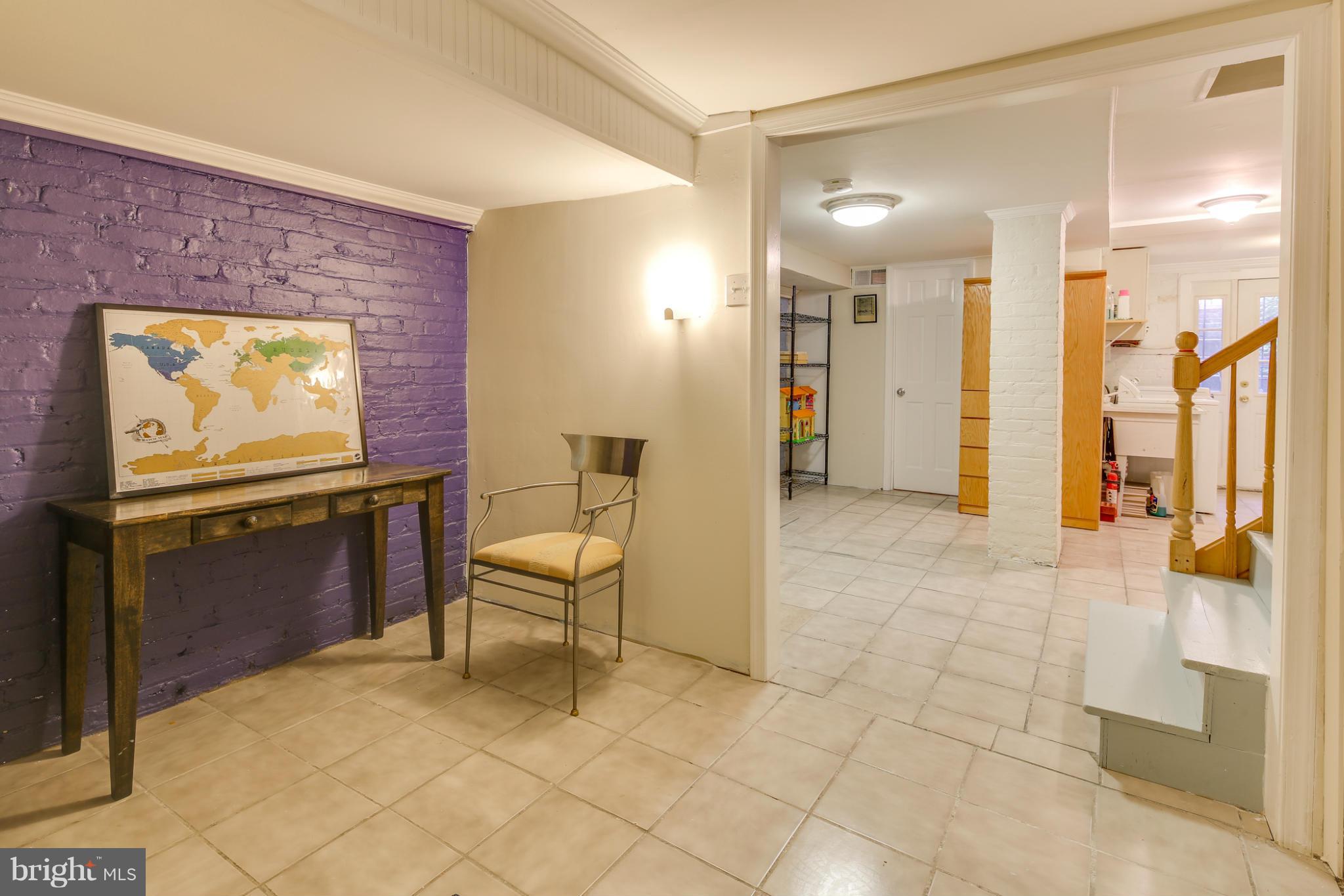2317 Ontario Road Northwest Washington, DC 20009 - Photo 26 of 30 a view of a hallway with seating area