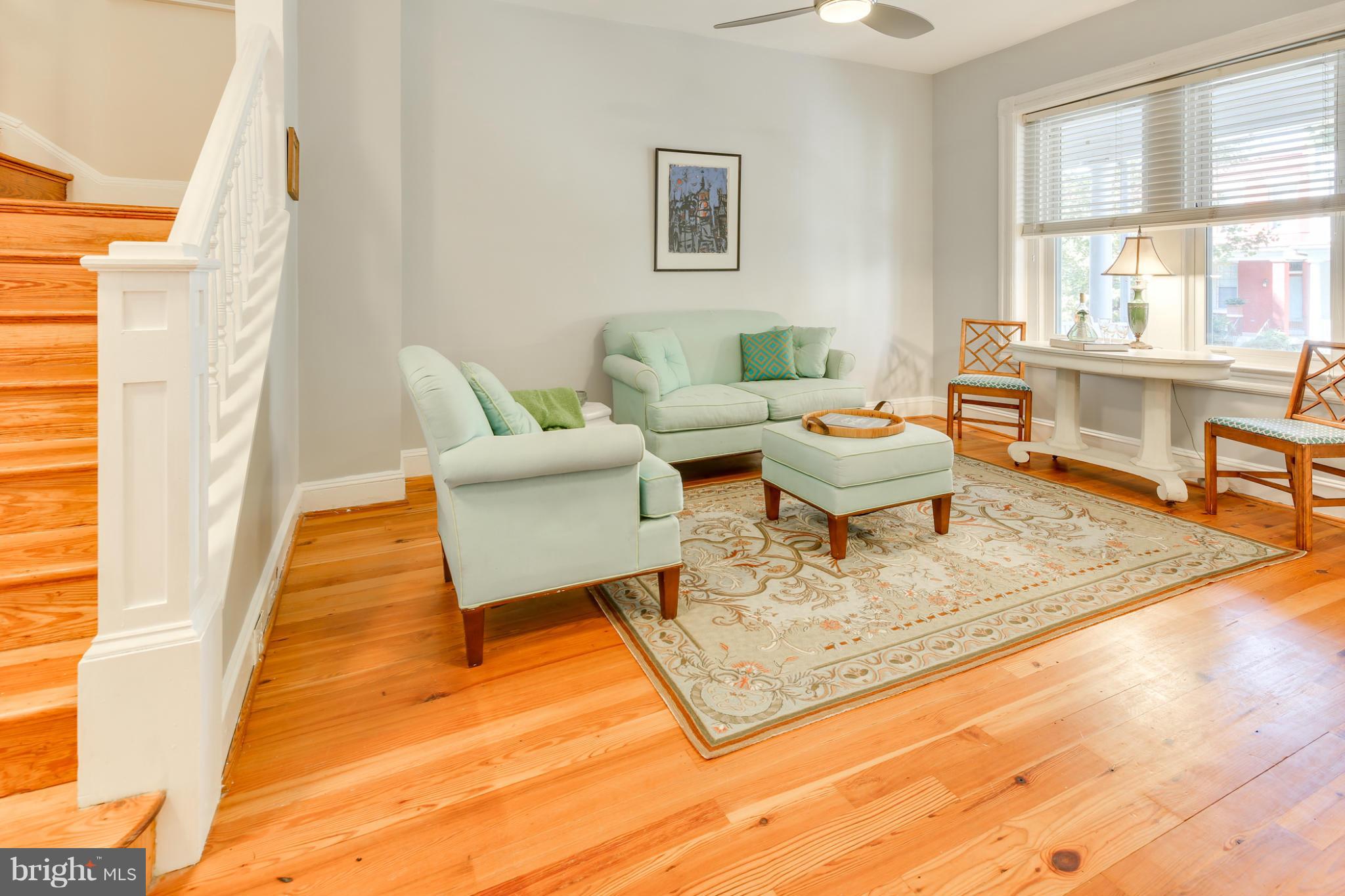 2317 Ontario Road Northwest Washington, DC 20009 - Photo 6 of 30 a living room with furniture and a rug