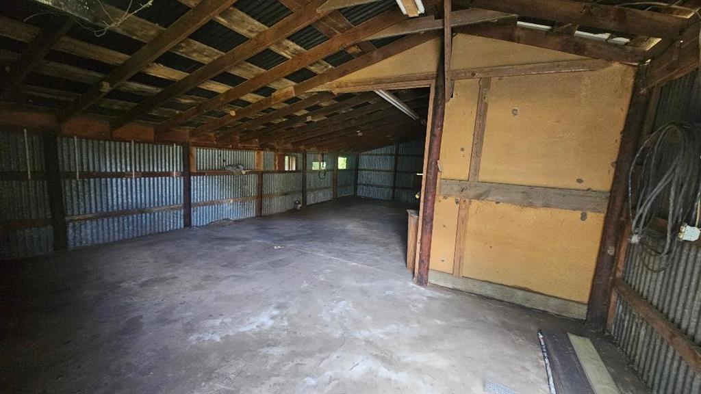 116 Cooper Street Pilot Point, TX 76258 - Photo 4 of 8 Interior of metal building