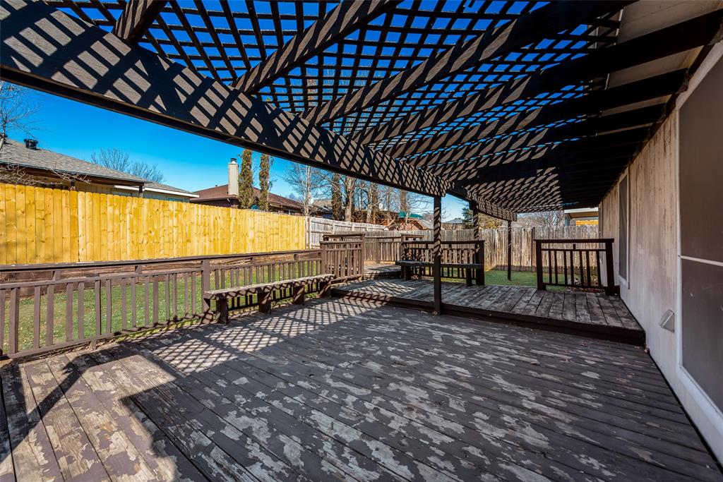 8129 Spruce Valley Drive Fort Worth, TX 76137 - Photo 16 of 19 a view of an empty room with wooden floor