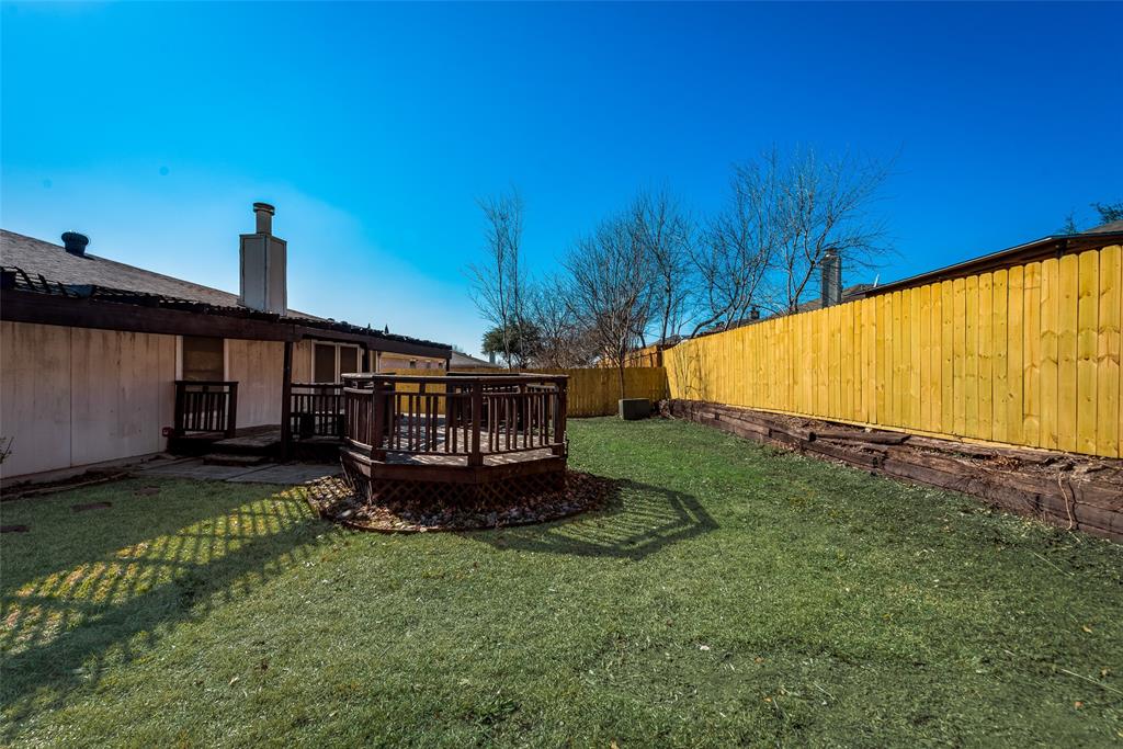 8129 Spruce Valley Drive Fort Worth, TX 76137 - Photo 19 of 19 a view of a house with backyard and garden