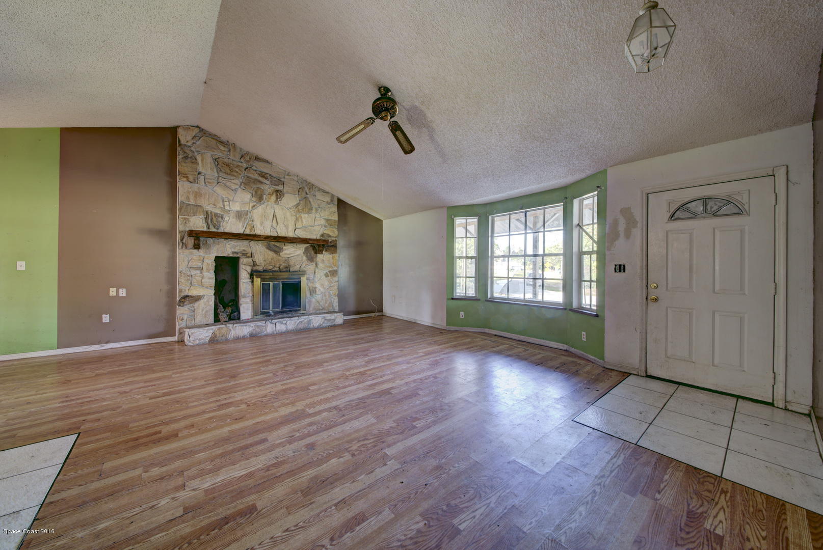5741 Flint Road Cocoa, FL 32927 - Photo 6 of 24 Living Area with Fireplace