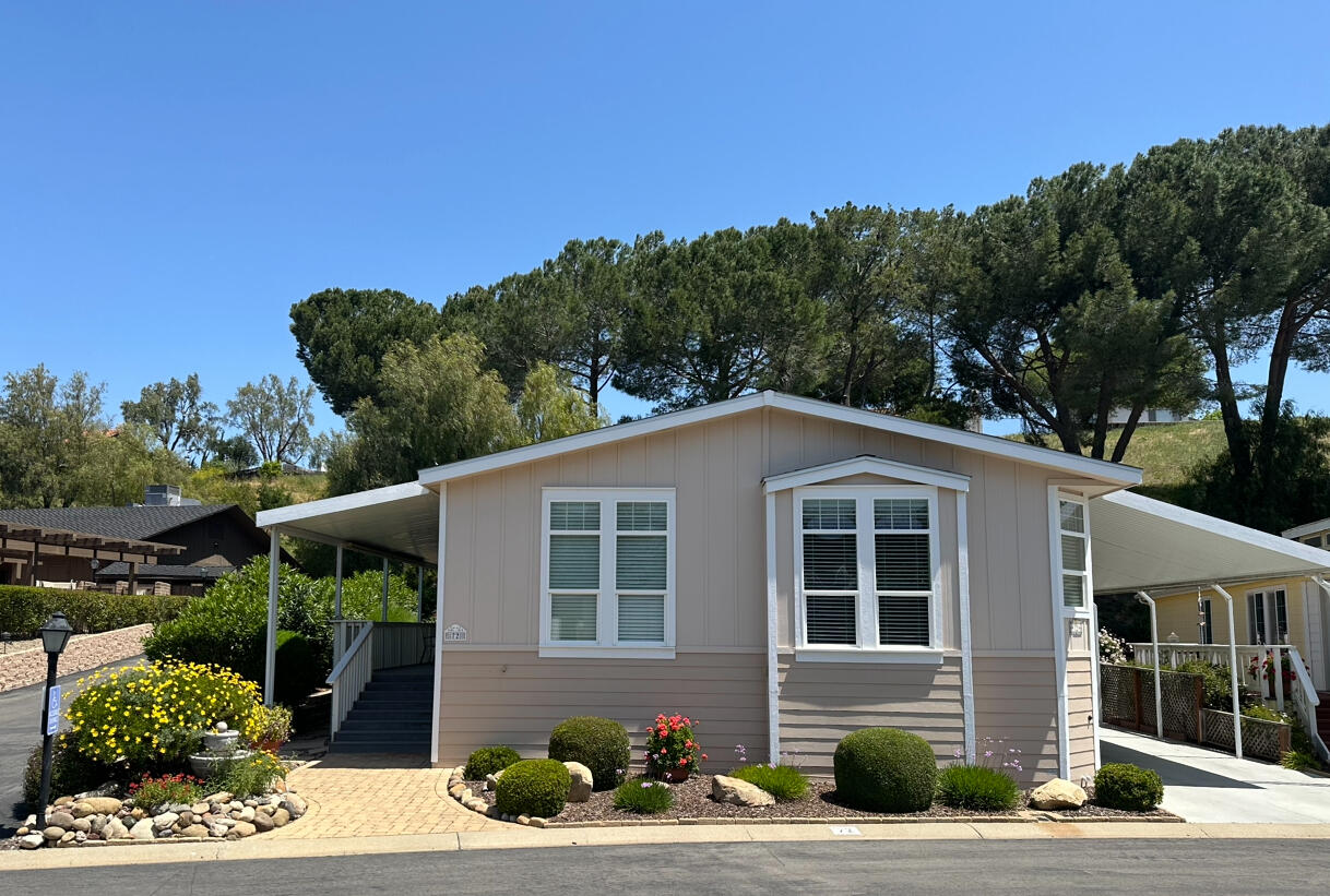 72 Alta Vista Solvang, CA 93463 - Photo 1 of 36 a front view of a house with a yard