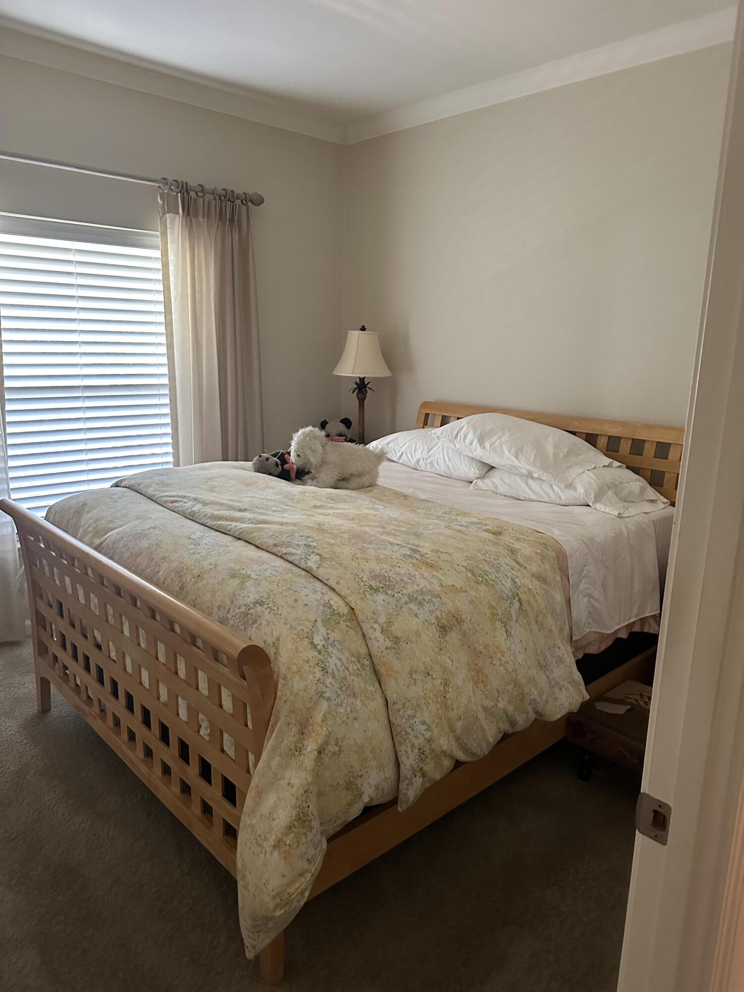 72 Alta Vista Solvang, CA 93463 - Photo 17 of 36 a bed sitting in a bedroom next to a window