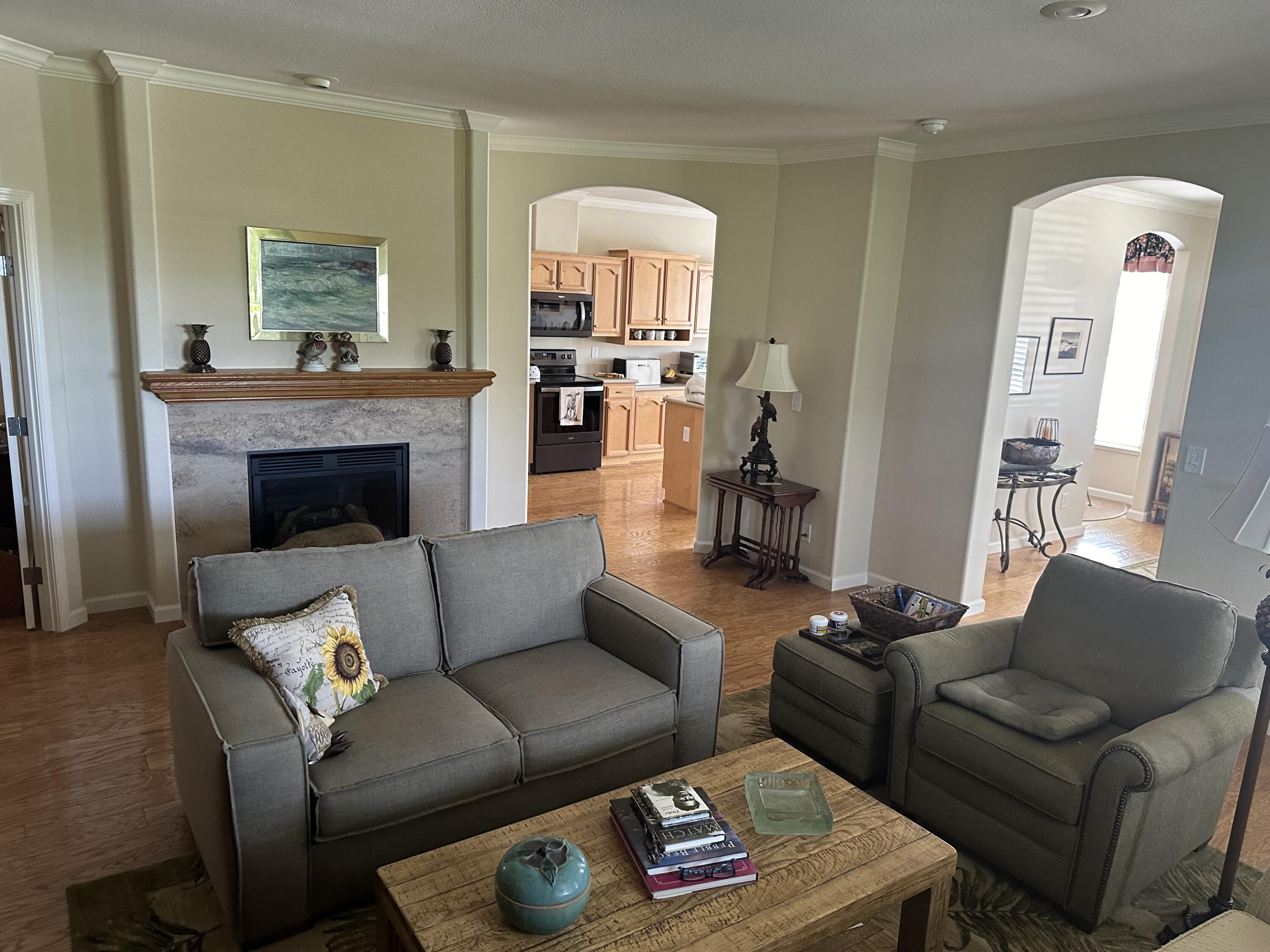 72 Alta Vista Solvang, CA 93463 - Photo 7 of 36 a living room with furniture and a fireplace