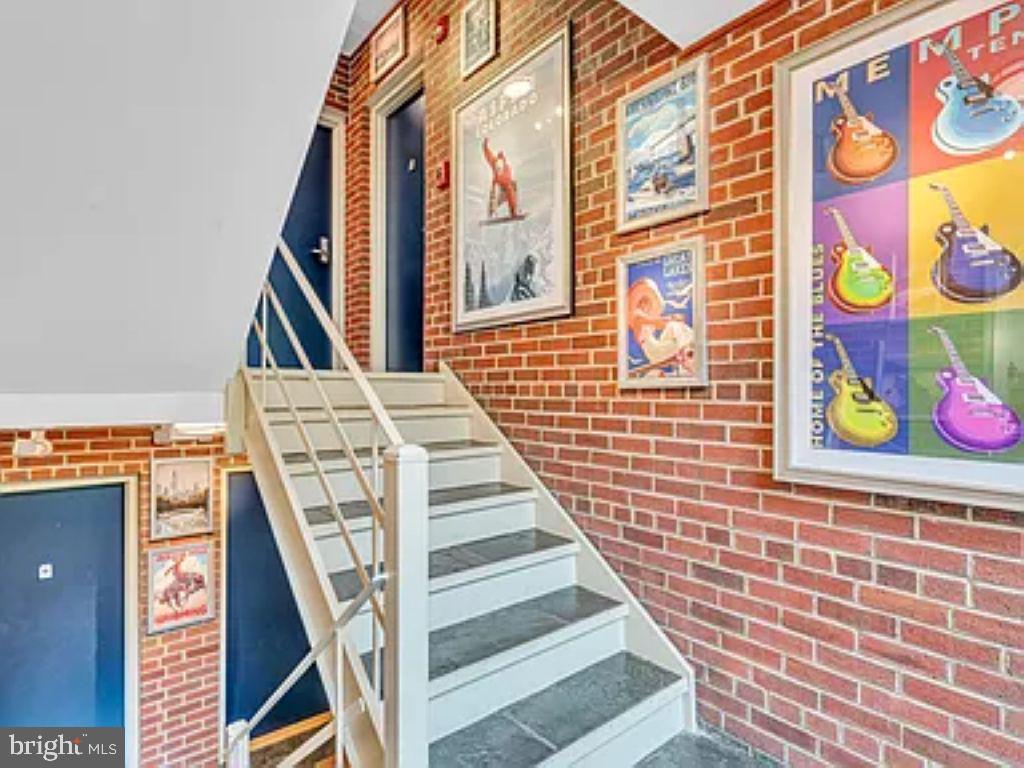 220 2nd Street Southeast, Unit 103 Washington, DC 20003 - Photo 17 of 21 a view of an entryway with wooden stairs