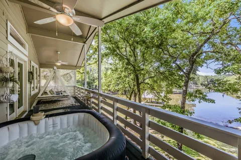 a view of swimming pool from a balcony