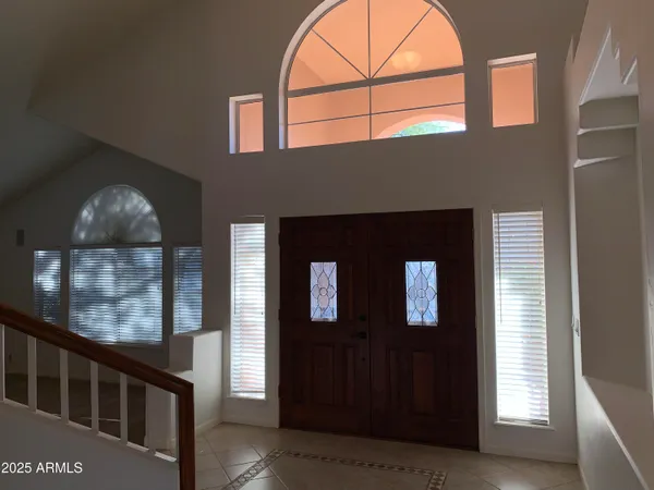 a view of an empty room with a closet