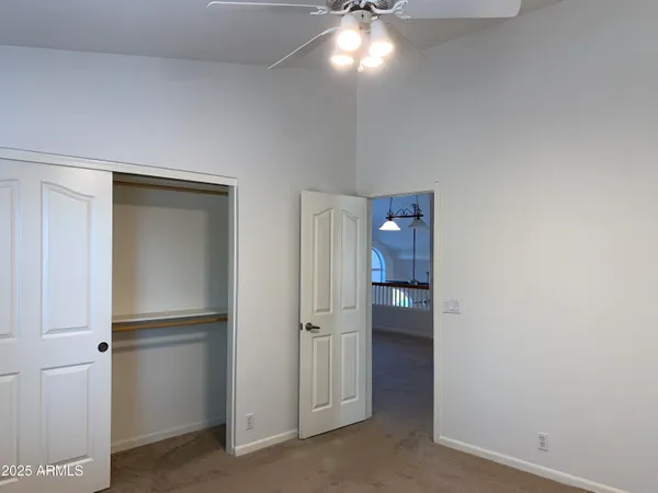 a view of a hallway with windows