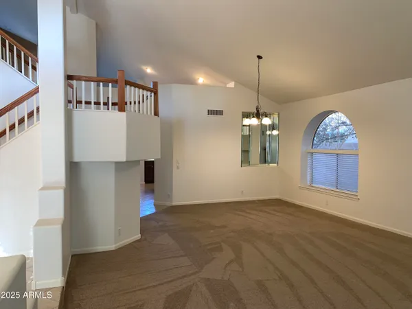 a view of a hallway with entryway
