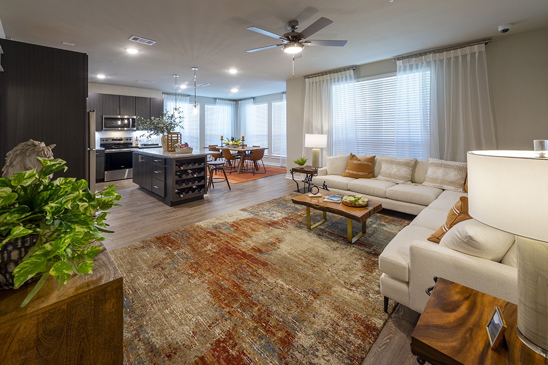 30020 Creekside Ter Drive, Unit 2114 Spring, TX 77386 - Photo 3 of 23 a living room with furniture and a large window