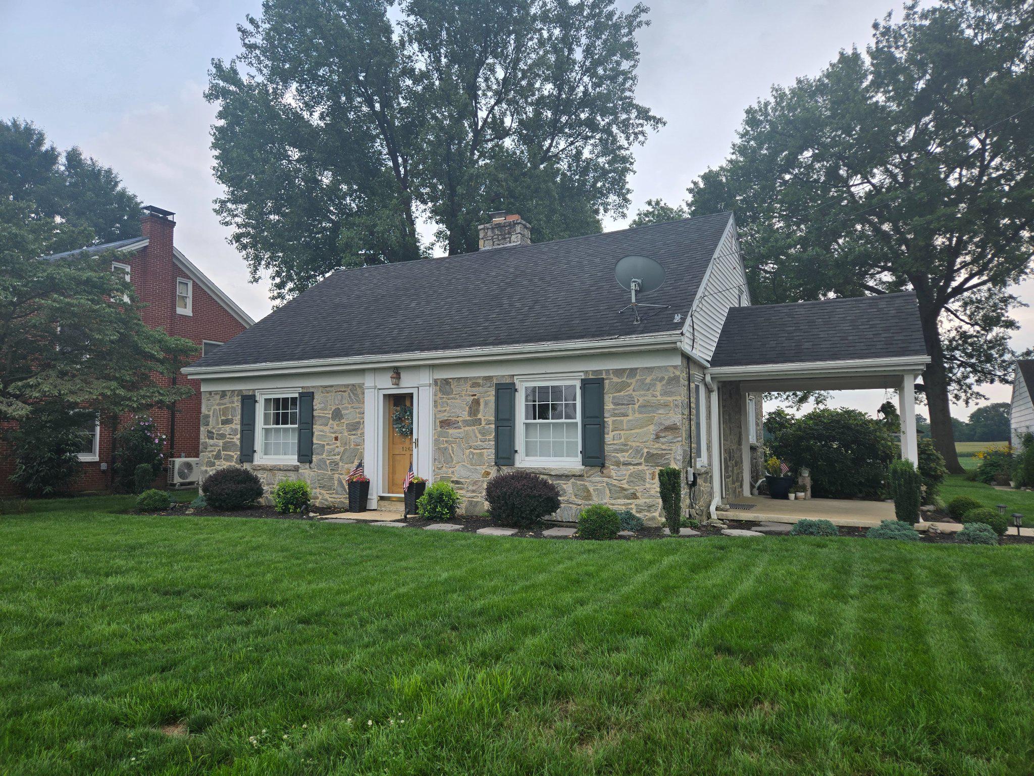 1262 Graystone Road, Unit 1262 Manheim, PA 17545 - Photo 2 of 9 Charming stone home with lush lawn.