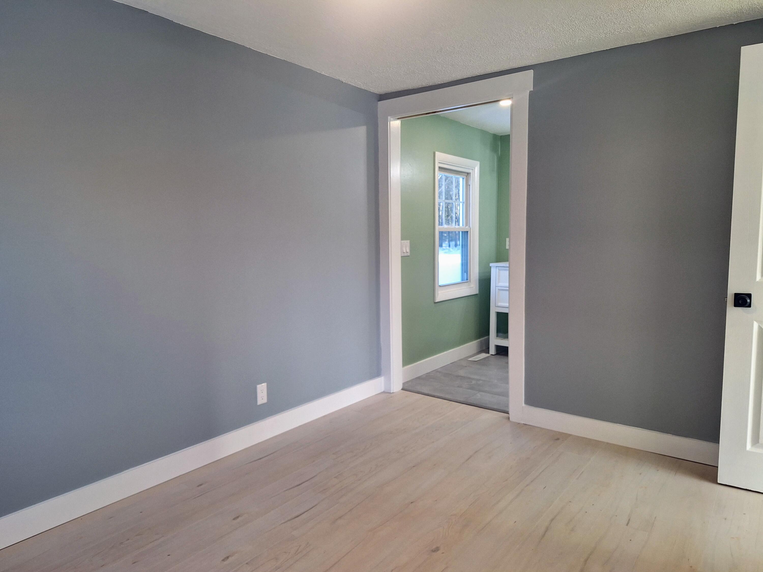 130 Tiger Hill Road Oxford, ME 04270 - Photo 20 of 32 primary bedroom to primary bath