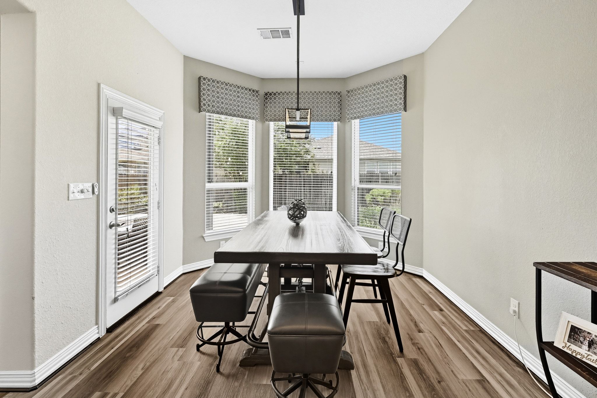 19620 Stanton Drew Pflugerville, TX 78660 - Photo 12 of 33 Dining space with dark wood-style flooring
