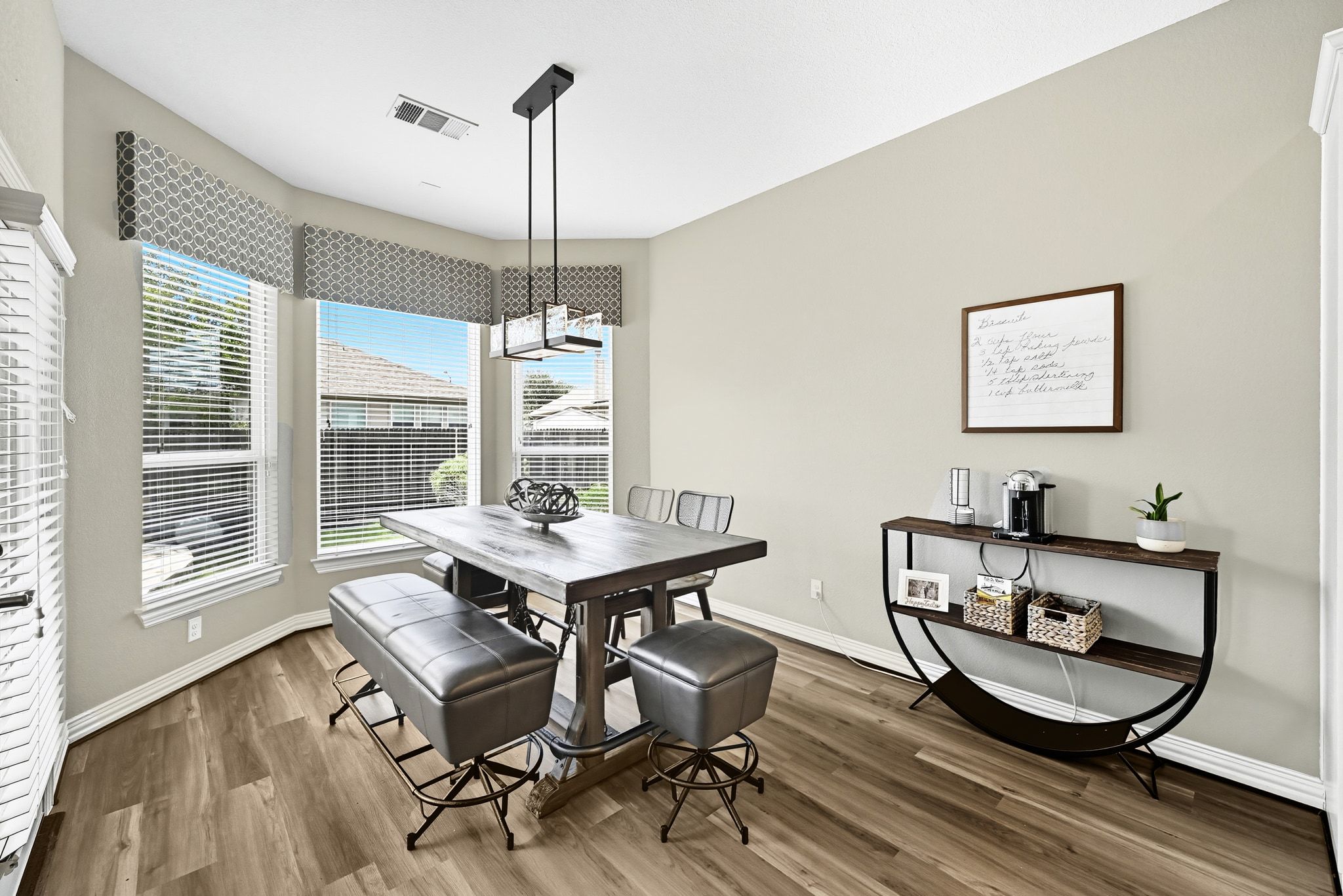 19620 Stanton Drew Pflugerville, TX 78660 - Photo 13 of 33 Dining space with wood finished floors
