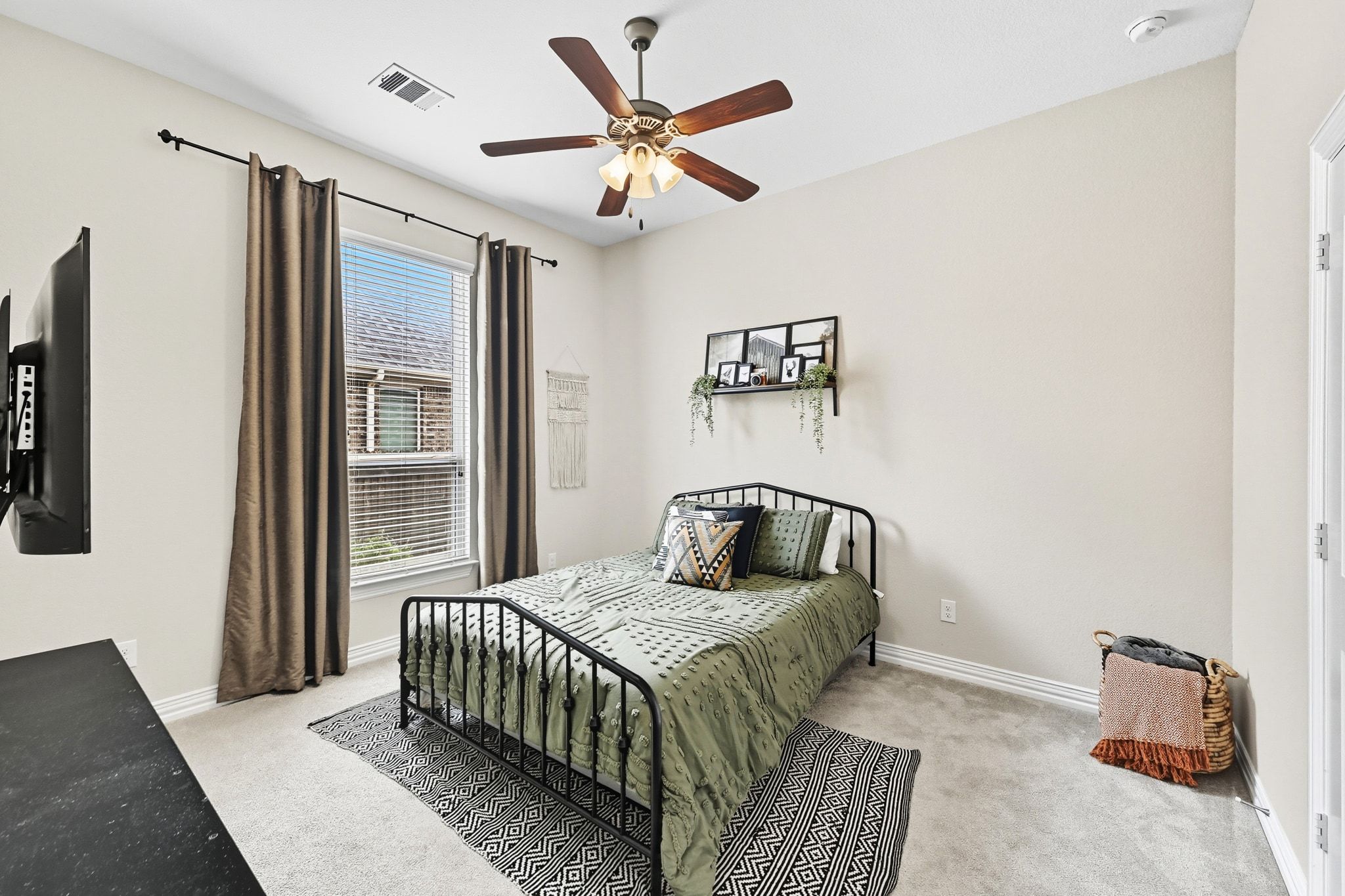 19620 Stanton Drew Pflugerville, TX 78660 - Photo 20 of 33 Bedroom with light carpet and ceiling fan
