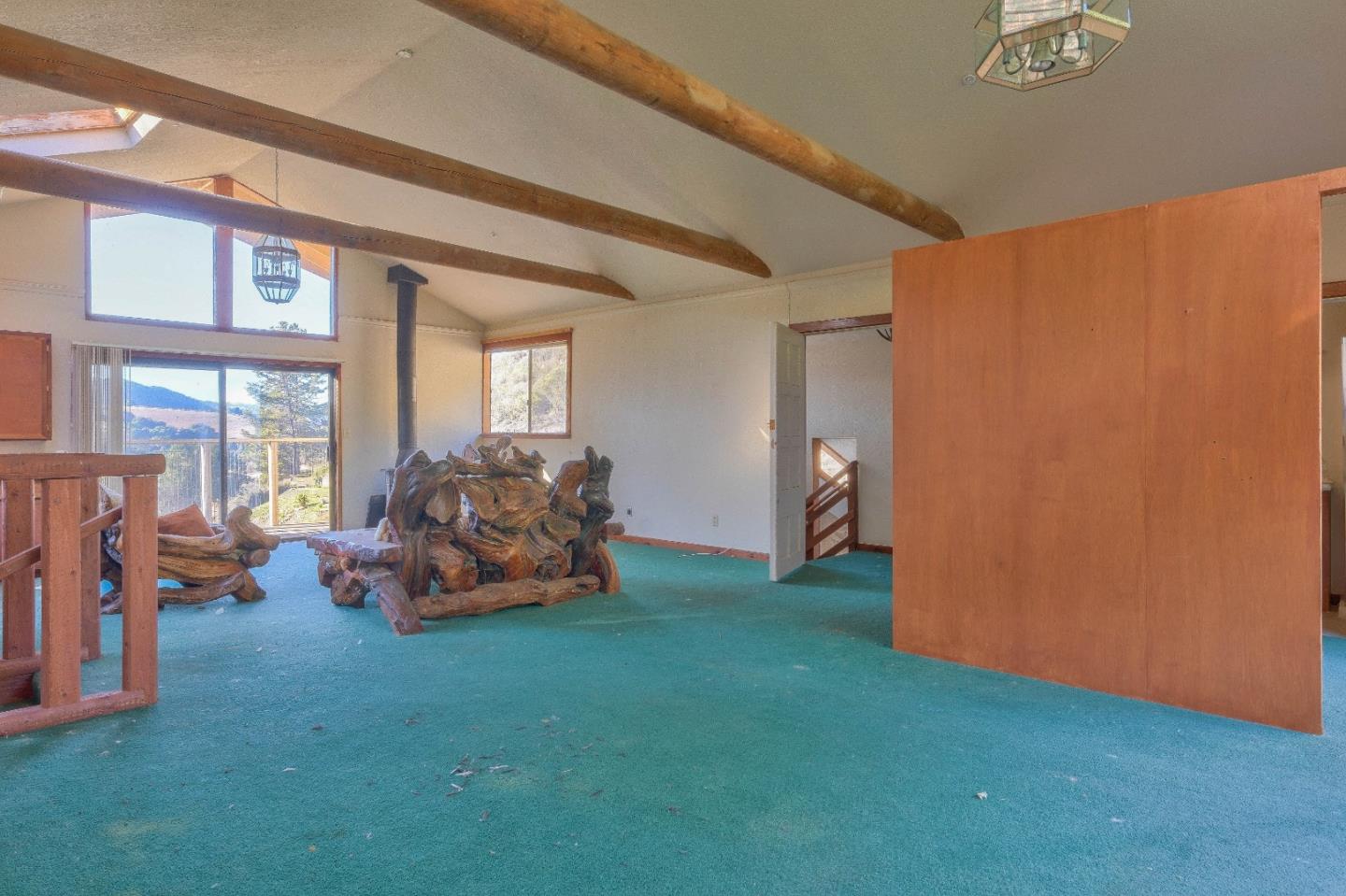384 Corral De Tierra Road Salinas, CA 93908 - Photo 14 of 31 a living room with furniture and a large window