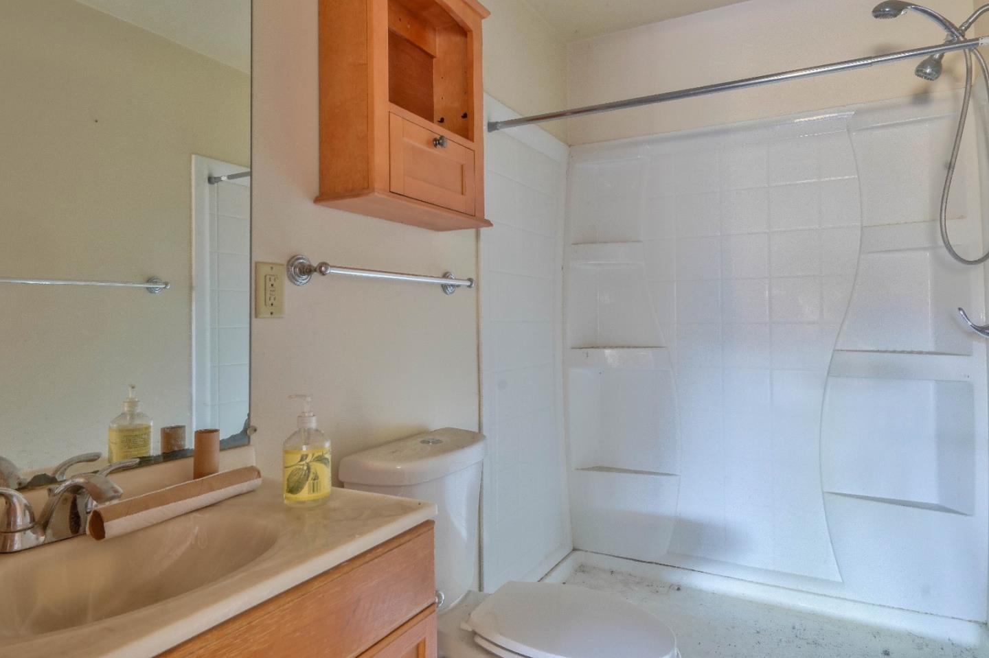 384 Corral De Tierra Road Salinas, CA 93908 - Photo 19 of 31 a bathroom with a sink and a mirror