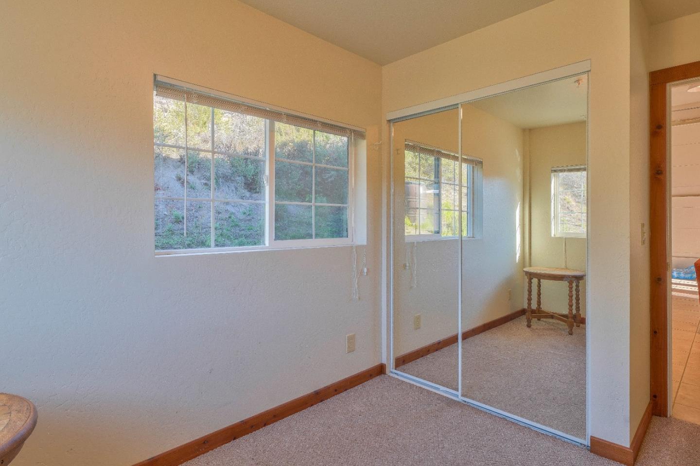 384 Corral De Tierra Road Salinas, CA 93908 - Photo 26 of 31 a view of an empty room with window and closet area