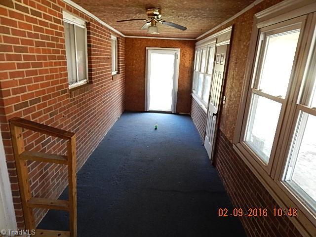 2618 Olivers Chapel Road Staley, NC 27355 - Photo 3 of 9 enclosed porch