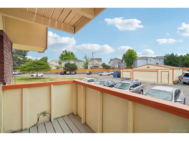 a view of a street from a balcony