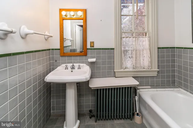 a bathroom with a sink and a bathtub