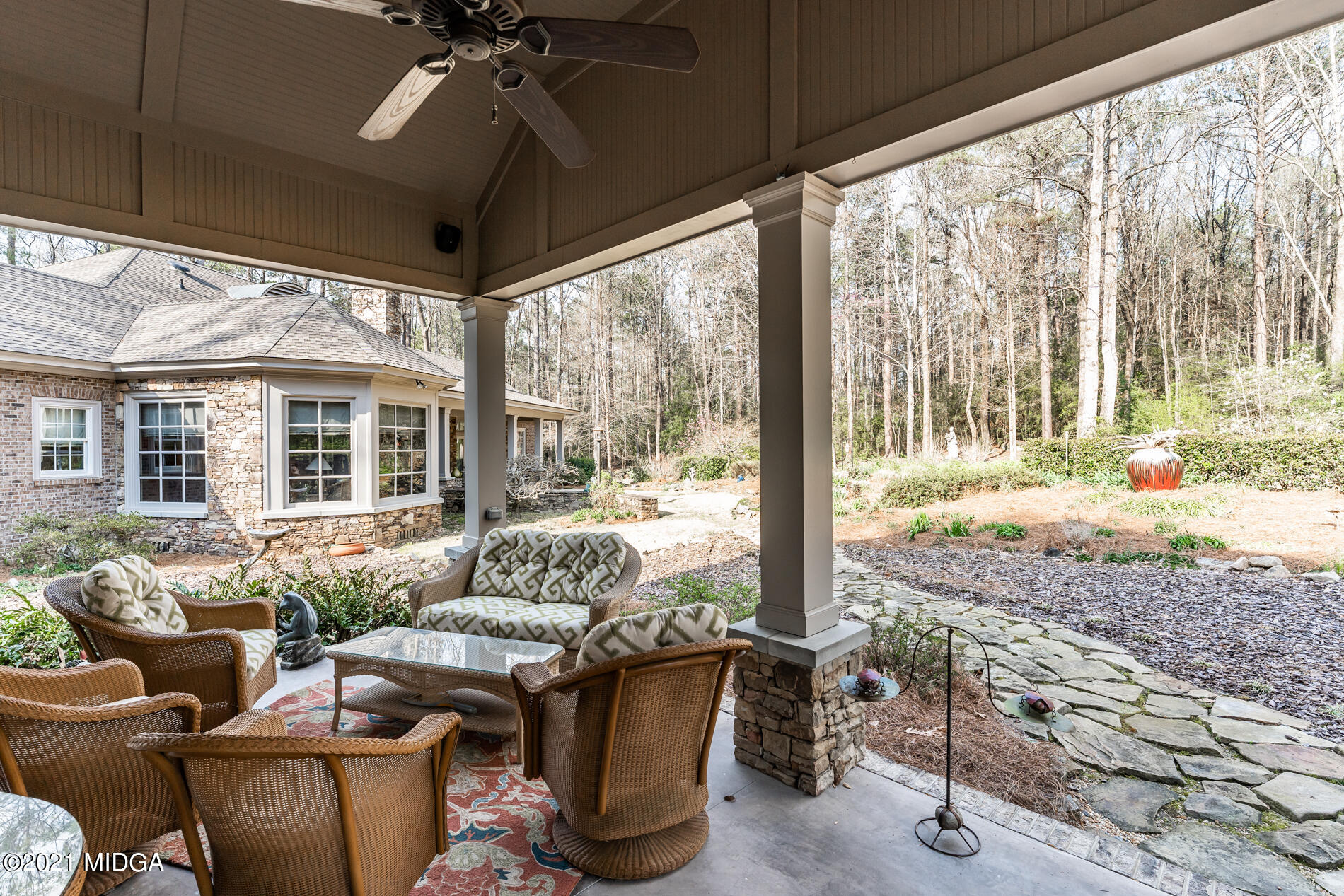 6848 Colaparchee Road Macon, GA 31210 - Photo 22 of 51 a living room with furniture and a large window