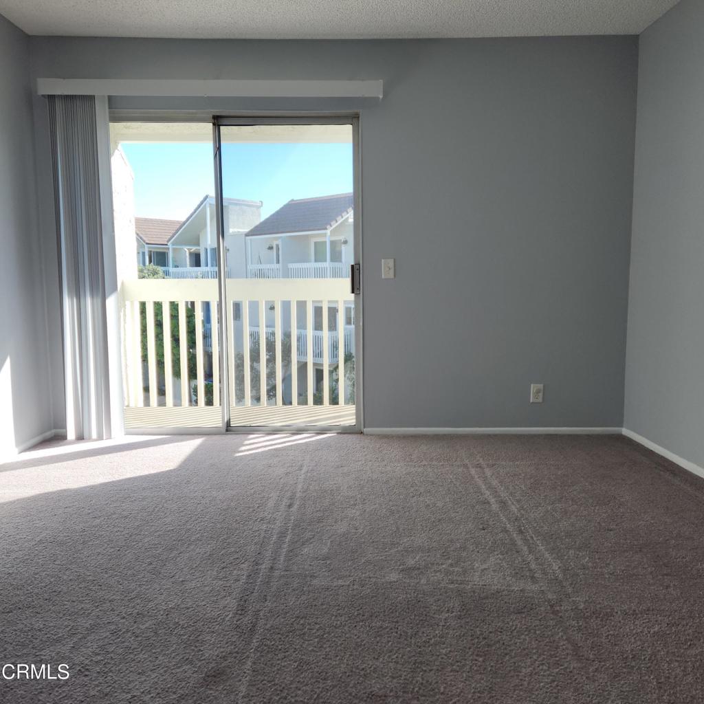 209 South Ventura Road, Unit 36 Port Hueneme, CA 93041 - Photo 22 of 35 a view of an empty room with a large window