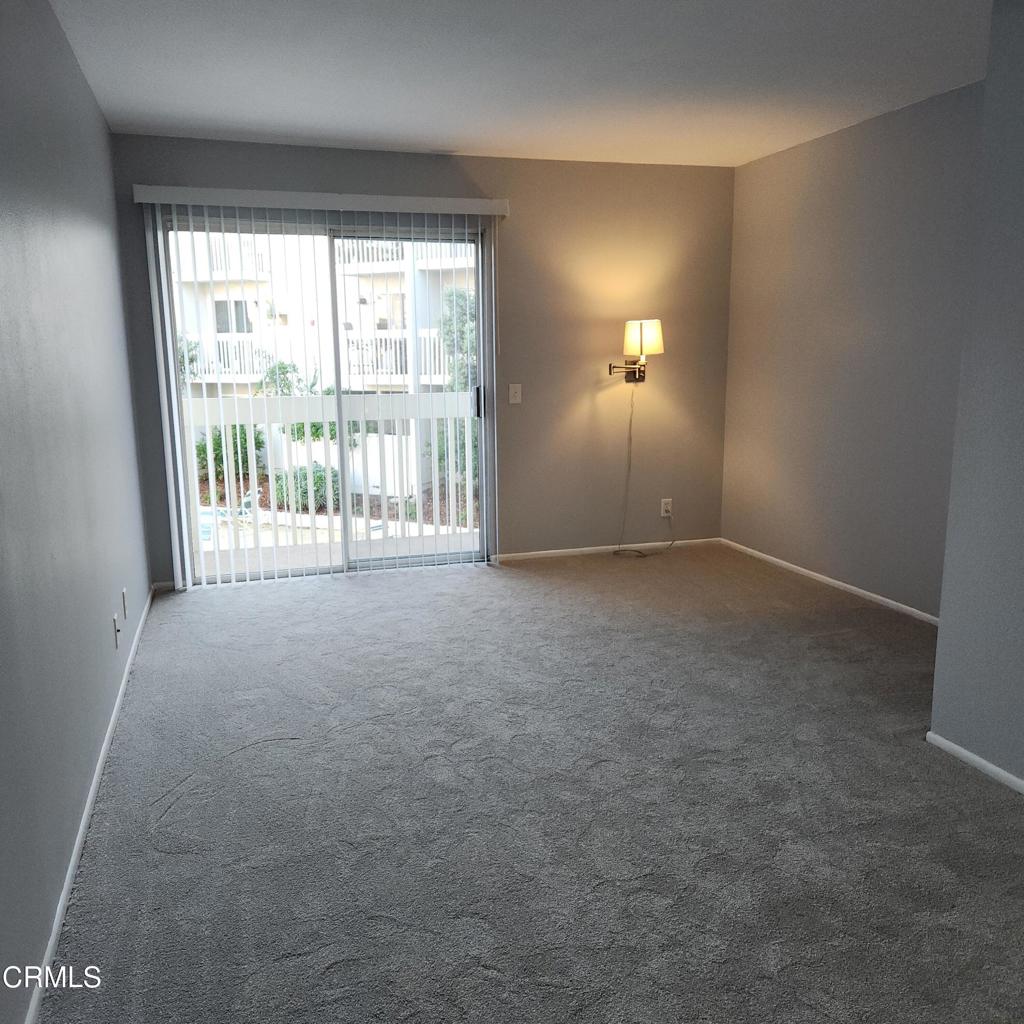 209 South Ventura Road, Unit 36 Port Hueneme, CA 93041 - Photo 6 of 35 a view of empty room with floor to ceiling window