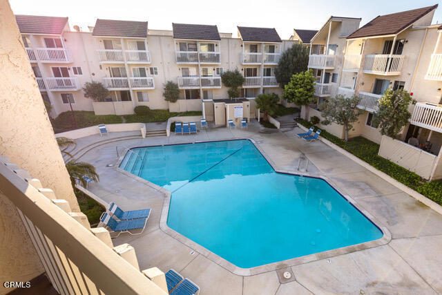 209 South Ventura Road, Unit 36 Port Hueneme, CA 93041 - Photo 8 of 35 a view of a swimming pool with outdoor seating
