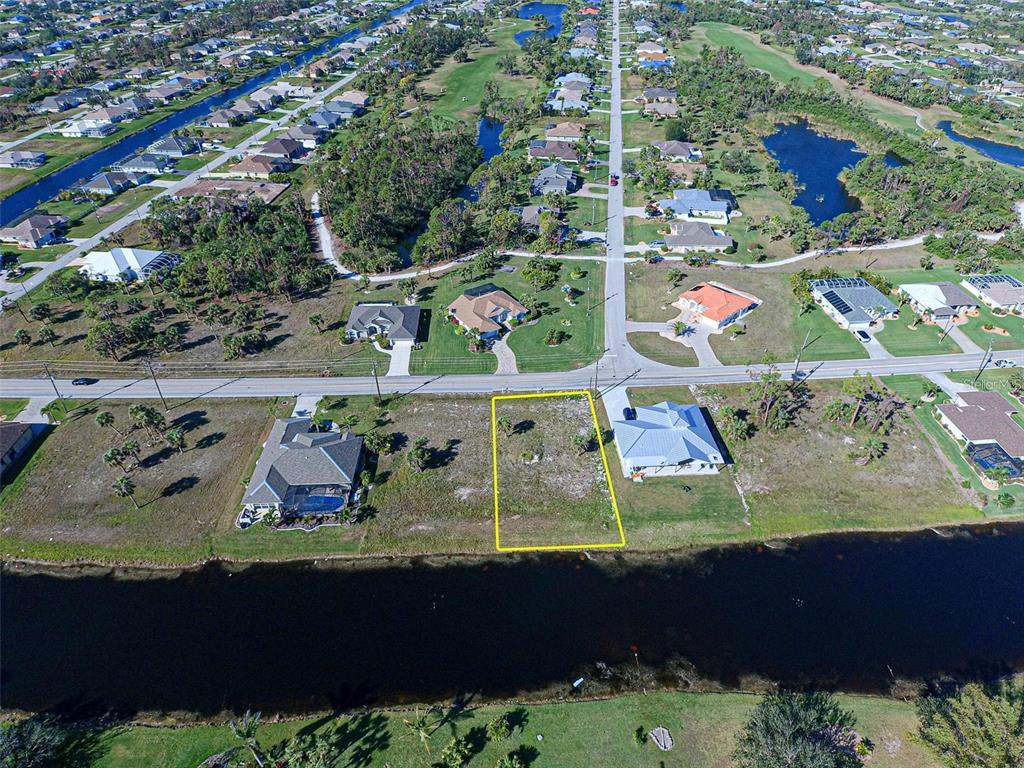 839 Rotonda Circle Rotonda West, FL 33947 - Photo 6 of 6 an aerial view of a house