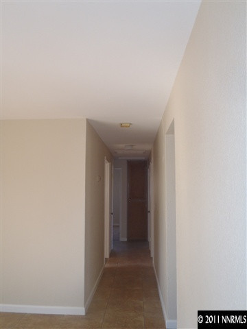 13012 Exinite Drive Reno, NV 89506 - Photo 8 of 12 a view of a hallway