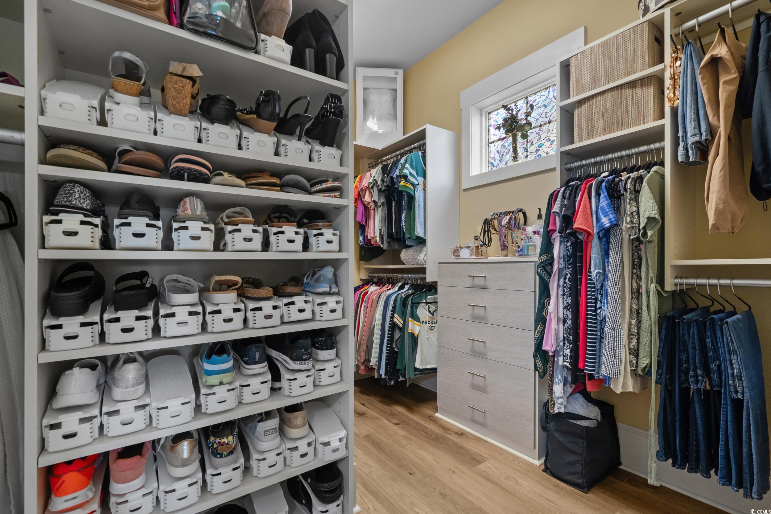 2604 Painted Trillium Court Myrtle Beach, SC 29579 - Photo 20 of 40 Spacious closet featuring light wood finished floors. Dual primary closets.