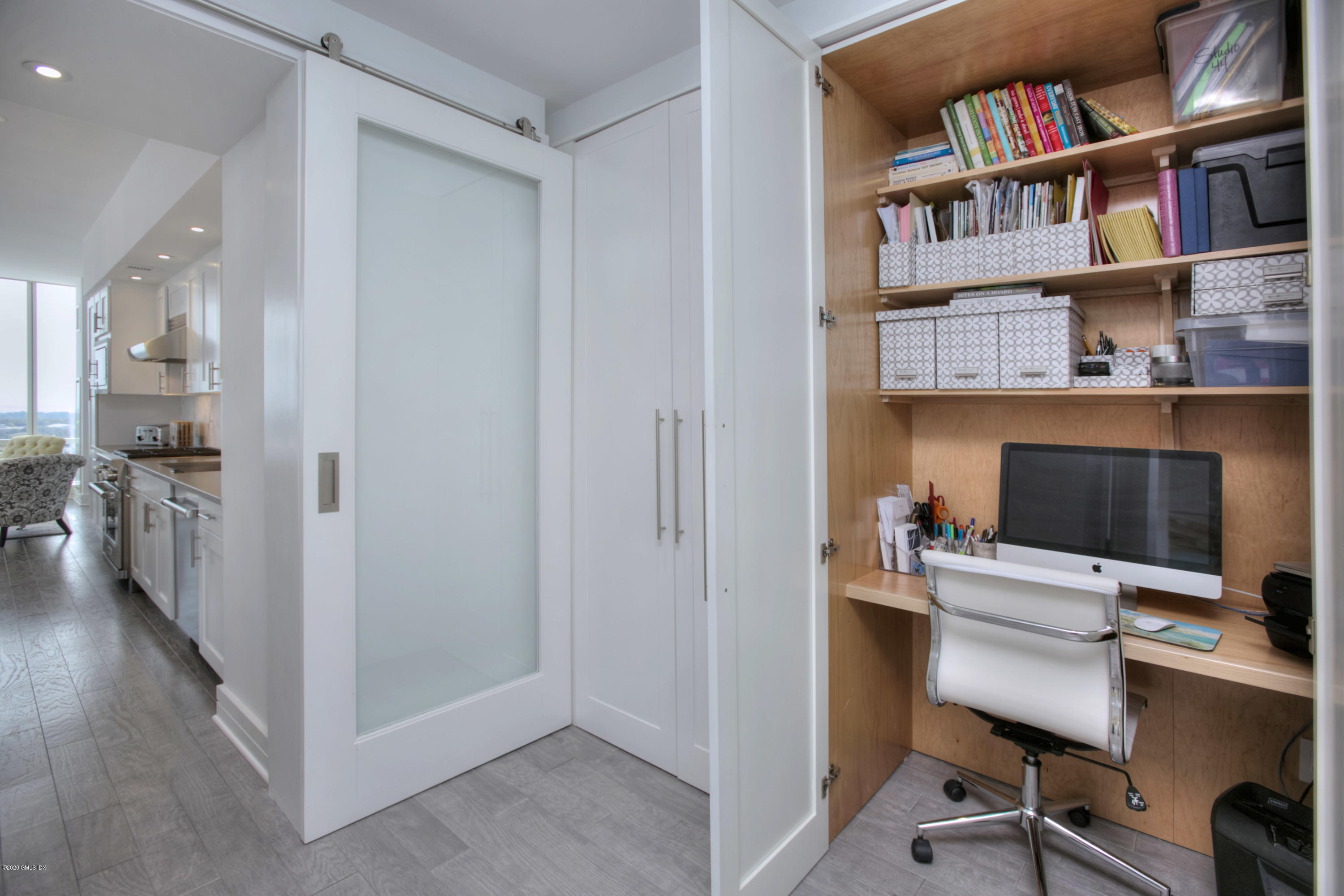 1 Broad Street, Unit PHD4 Stamford, CT 06901 - Photo 12 of 38 a view of a workspace with furniture