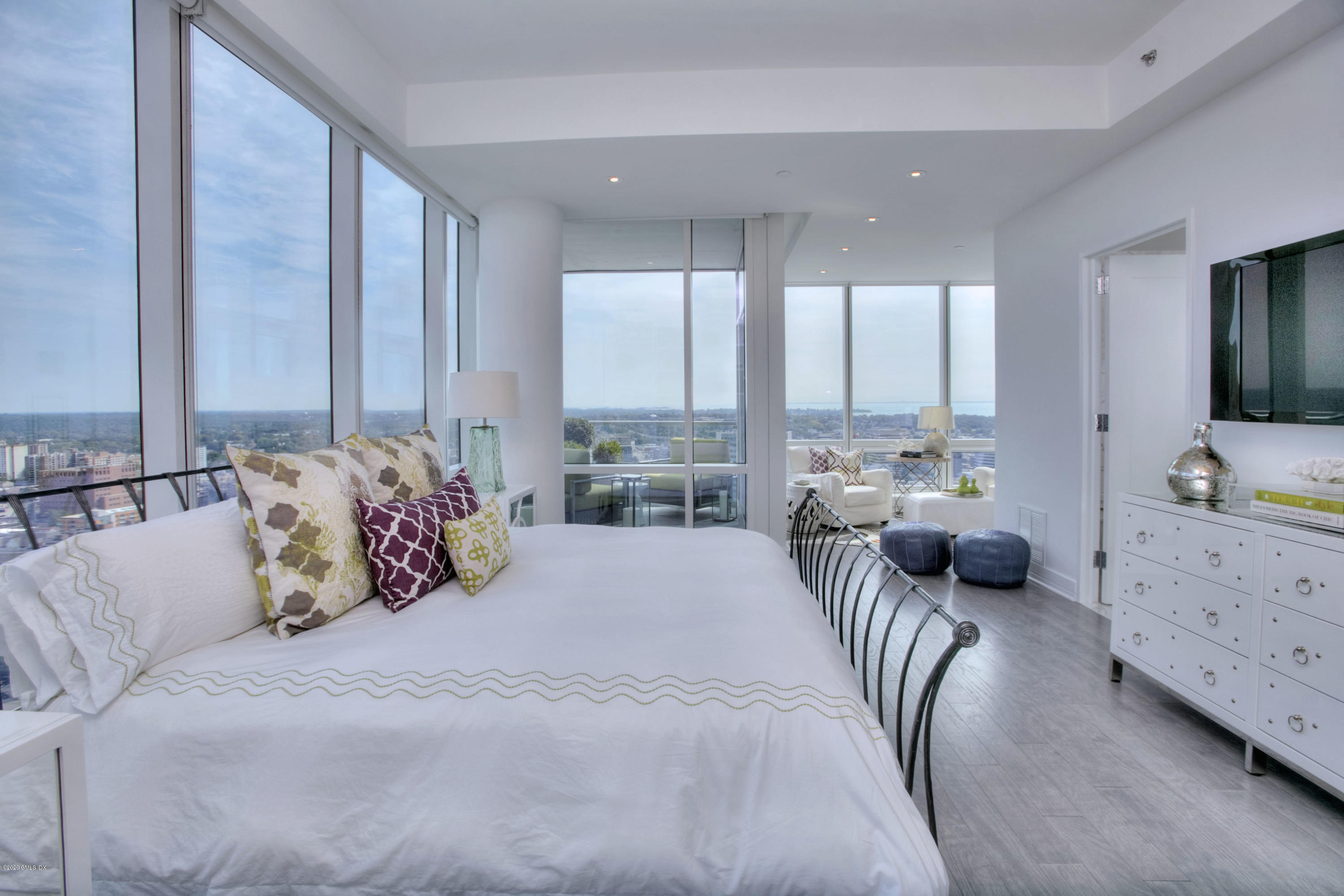 1 Broad Street, Unit PHD4 Stamford, CT 06901 - Photo 18 of 38 a bedroom with furniture and a large window
