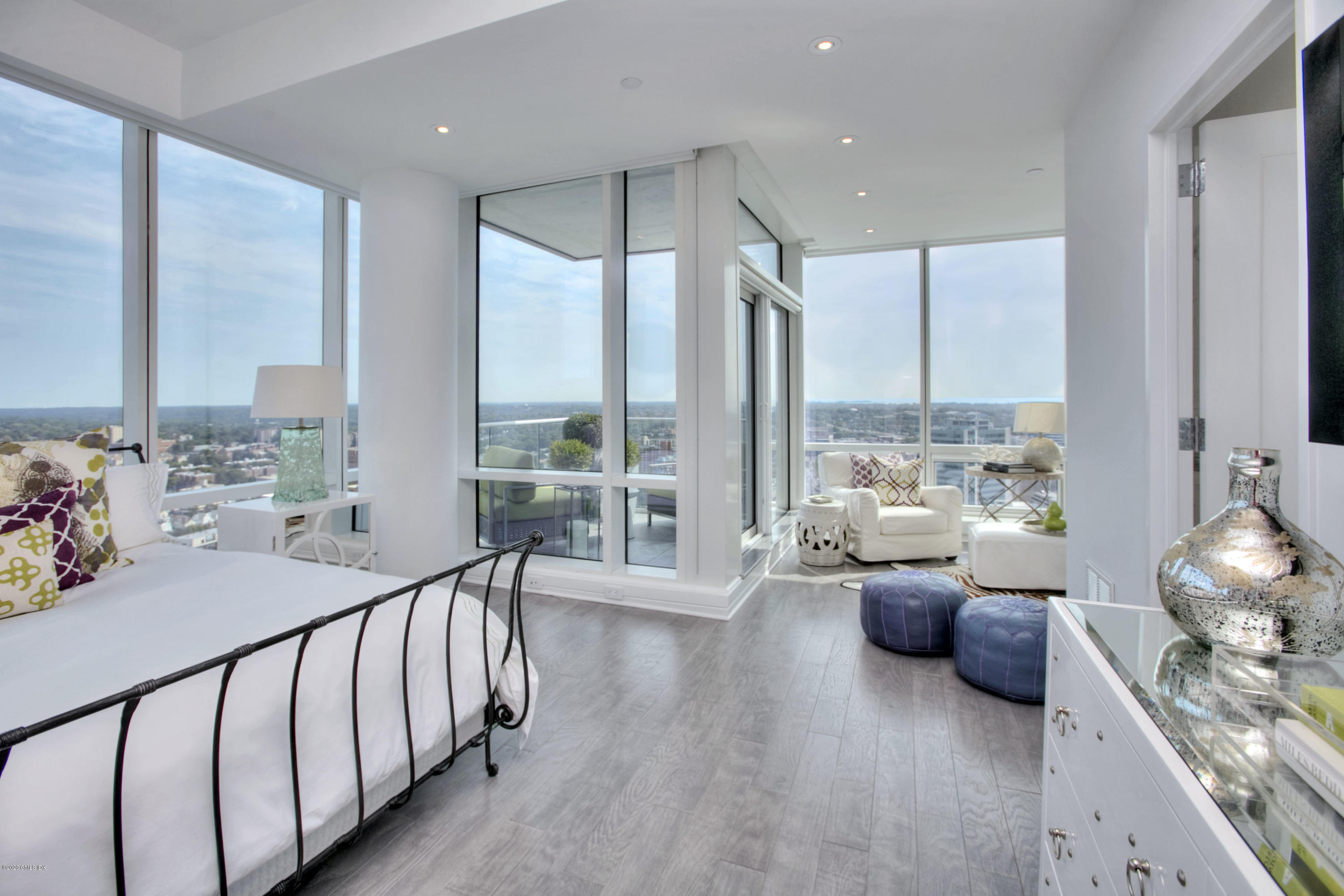 1 Broad Street, Unit PHD4 Stamford, CT 06901 - Photo 20 of 38 a bedroom with furniture and a large window
