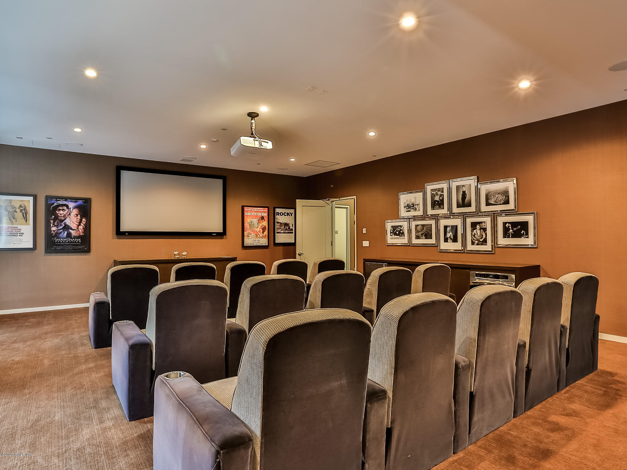 1 Broad Street, Unit PHD4 Stamford, CT 06901 - Photo 35 of 38 a media room with lots of chairs and a projector screen
