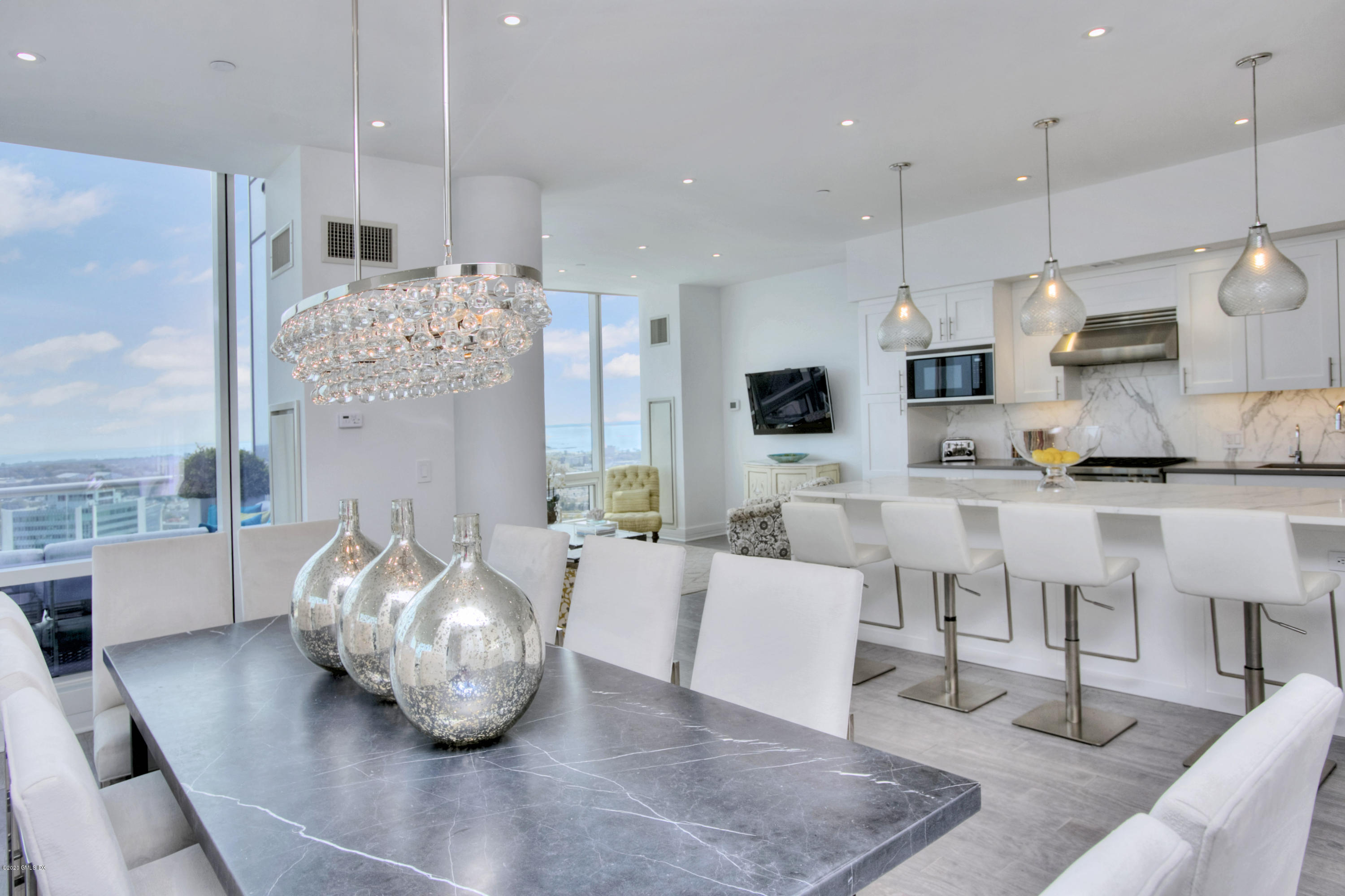 1 Broad Street, Unit PHD4 Stamford, CT 06901 - Photo 9 of 38 a living room with furniture and a wooden floor