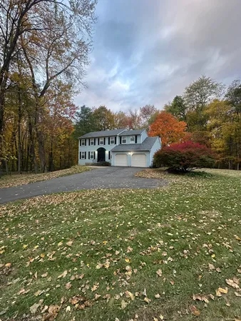 a view of a house with a big yard